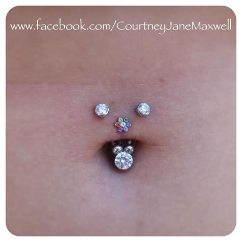 curved navel piercing.